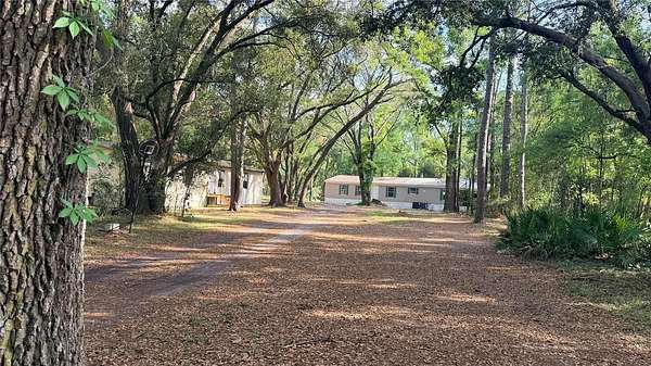 5.5 Acres of Land with Home for Sale in Live Oak, Florida