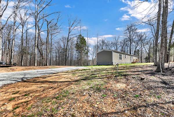 2.89 Acres of Land with Home for Sale in Palmyra, Tennessee
