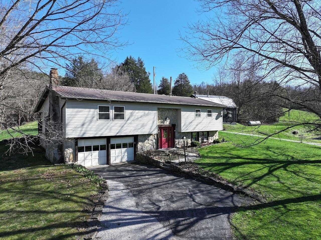 11.1 Acres of Land with Home for Sale in Foster, Kentucky