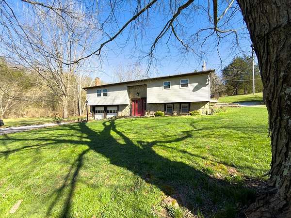 10.3 Acres of Land with Home for Sale in Foster, Kentucky