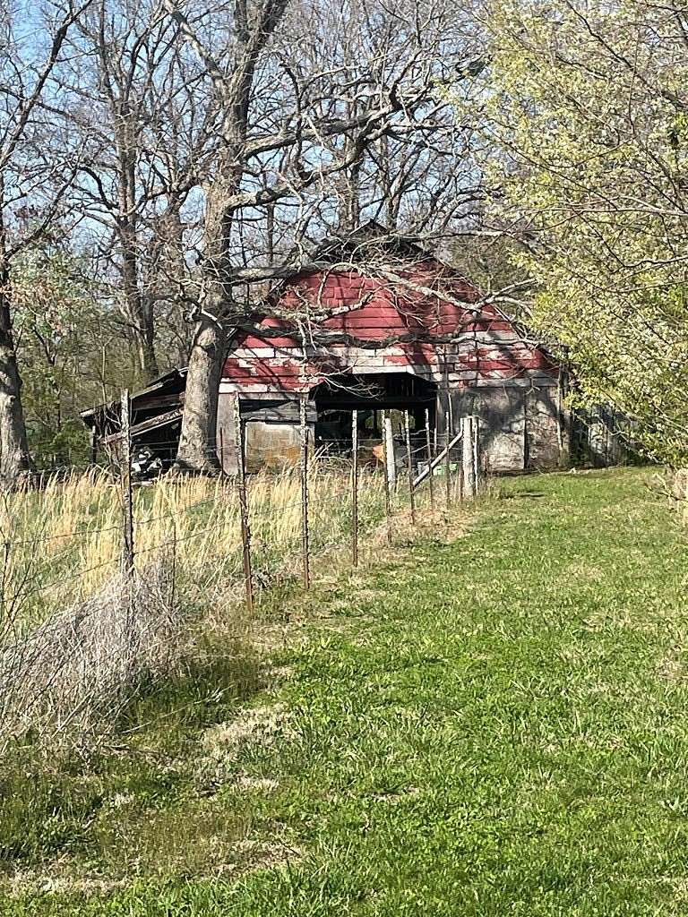 7.8 Acres of Land with Home for Sale in Clarkrange, Tennessee