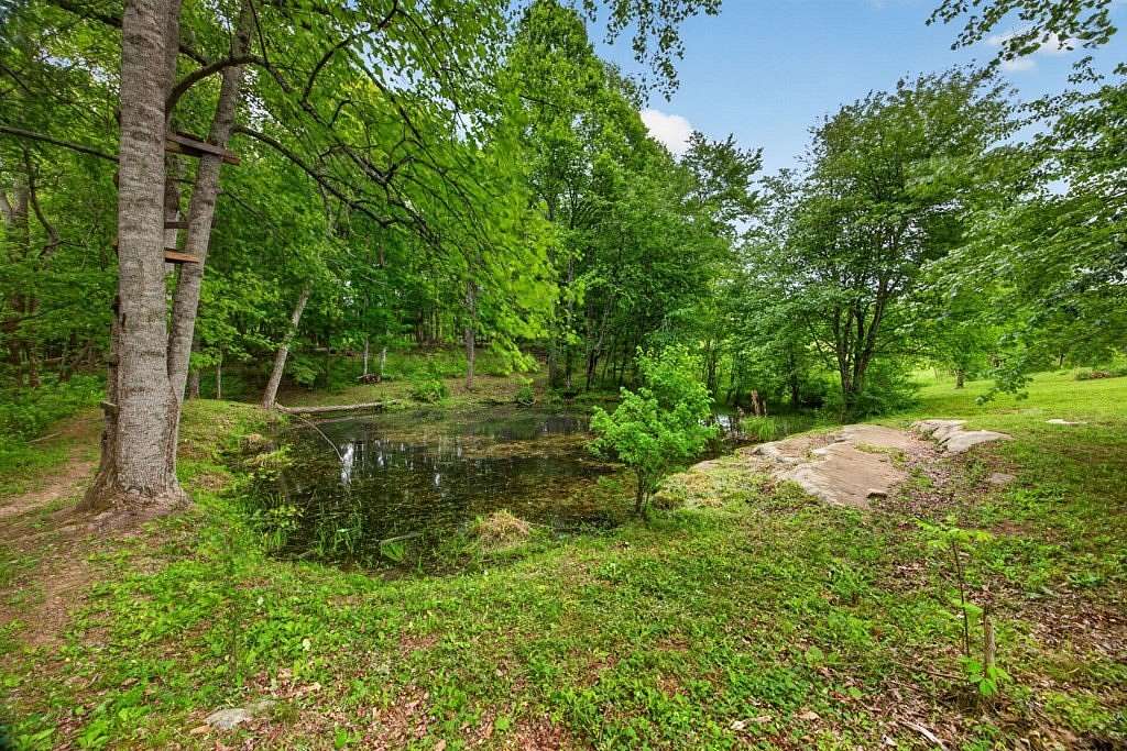 7.8 Acres of Land with Home for Sale in Clarkrange, Tennessee