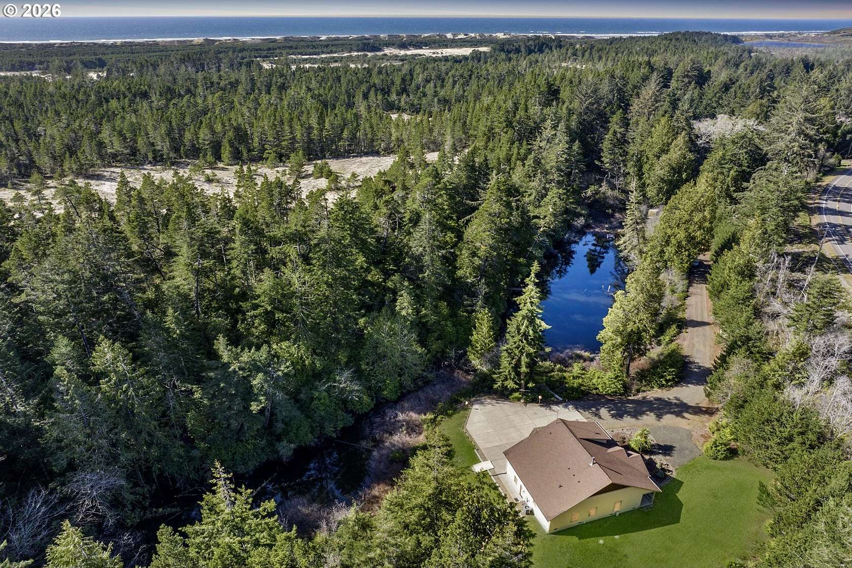 6.9 Acres of Land with Home for Sale in Florence, Oregon