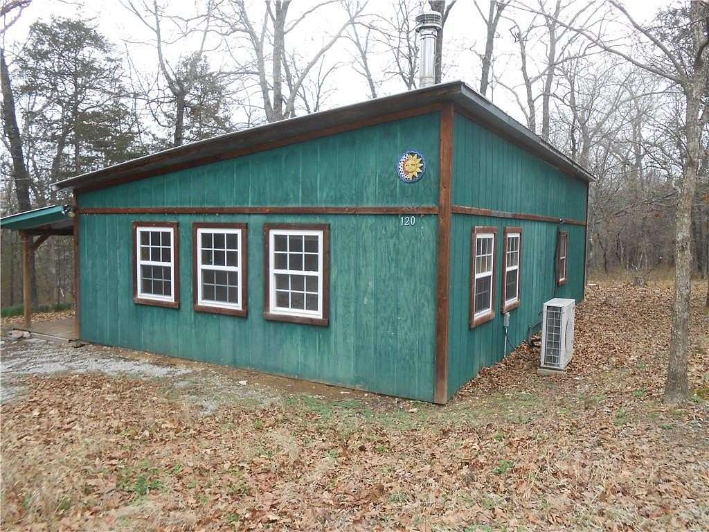 3.4 Acres of Land with Home for Auction in Berryville, Arkansas