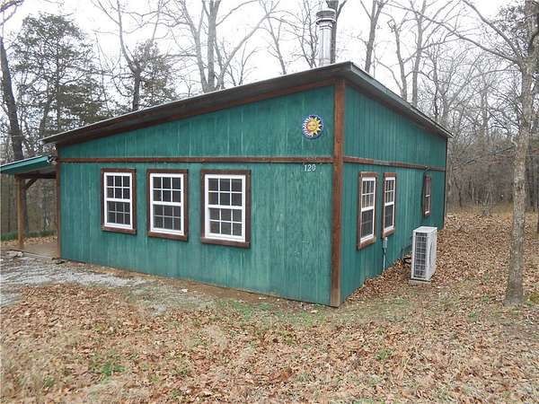 3.4 Acres of Land with Home for Auction in Berryville, Arkansas