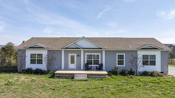 60 Acres of Agricultural Land with Home for Sale in Spring City, Tennessee