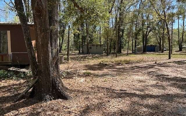 5.14 Acres of Land with Home for Sale in Live Oak, Florida