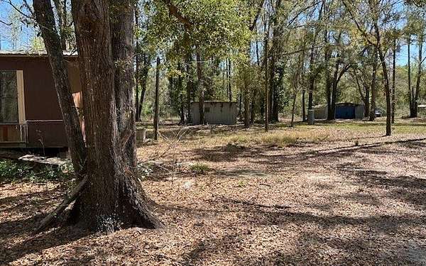 5.14 Acres of Land with Home for Sale in Live Oak, Florida