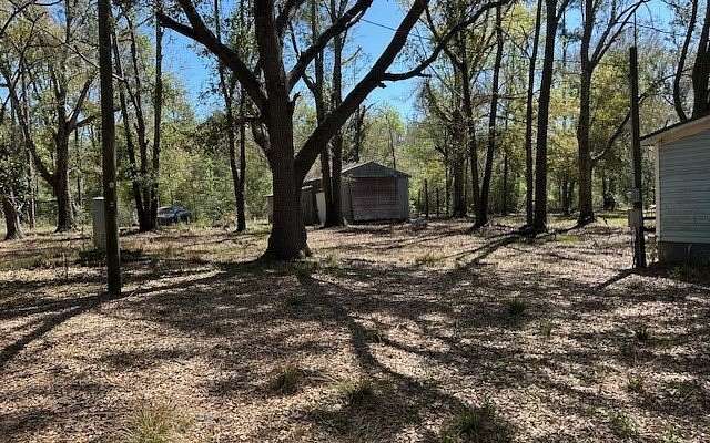 5 Acres of Land with Home for Sale in Live Oak, Florida
