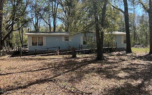 5 Acres of Land with Home for Sale in Live Oak, Florida