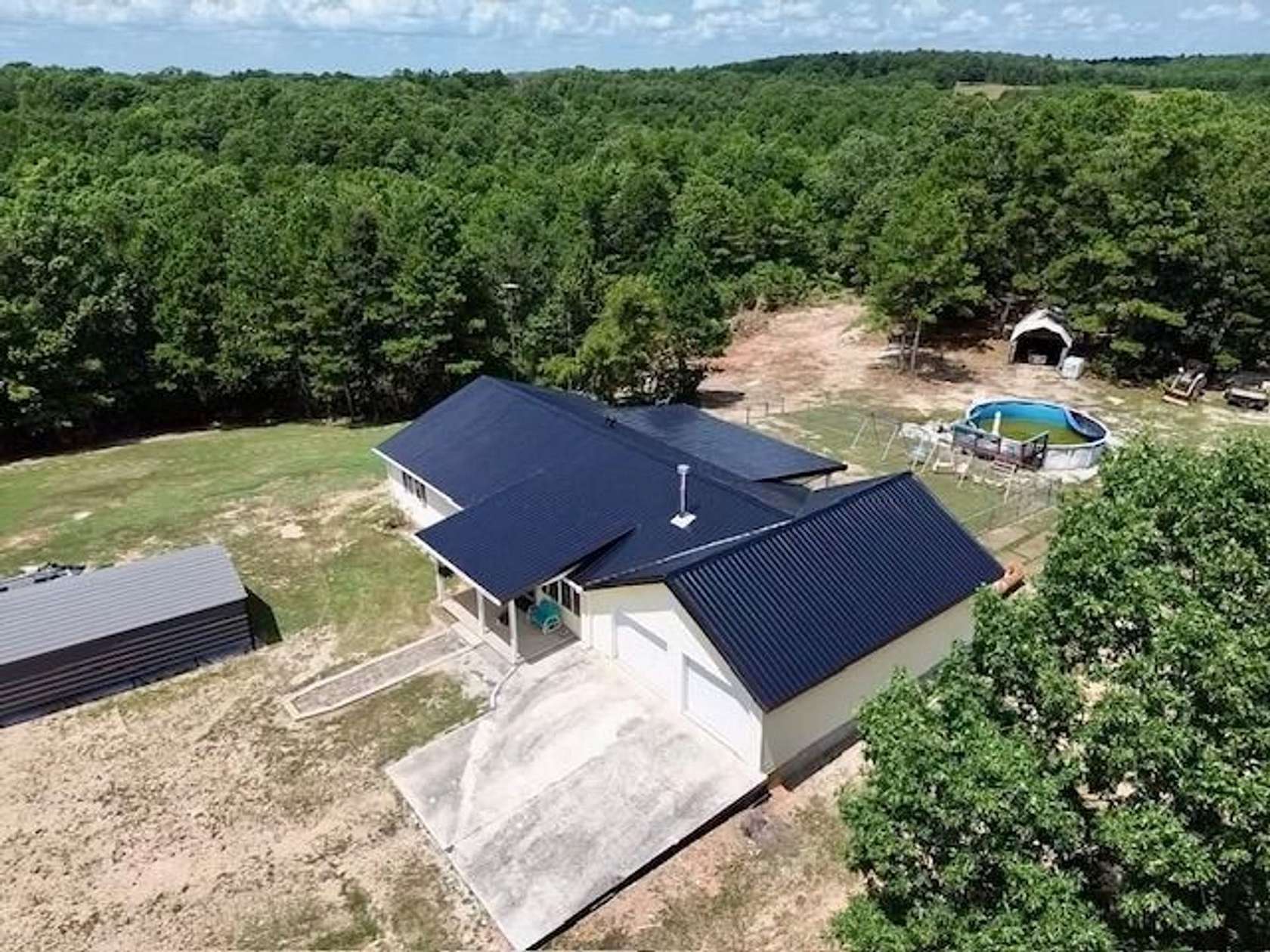 10 Acres of Land with Home for Sale in St. Joe, Arkansas