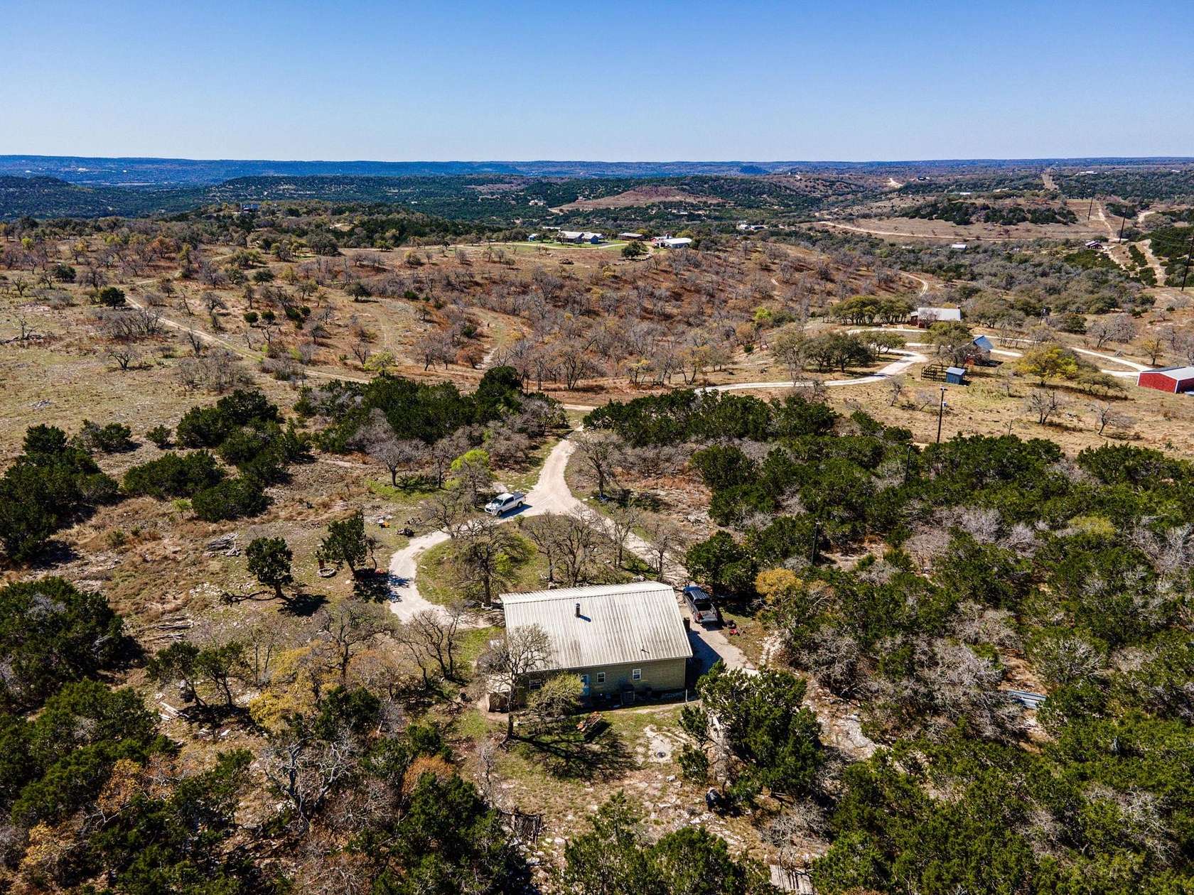 5.15 Acres of Land with Home for Sale in Blanco, Texas