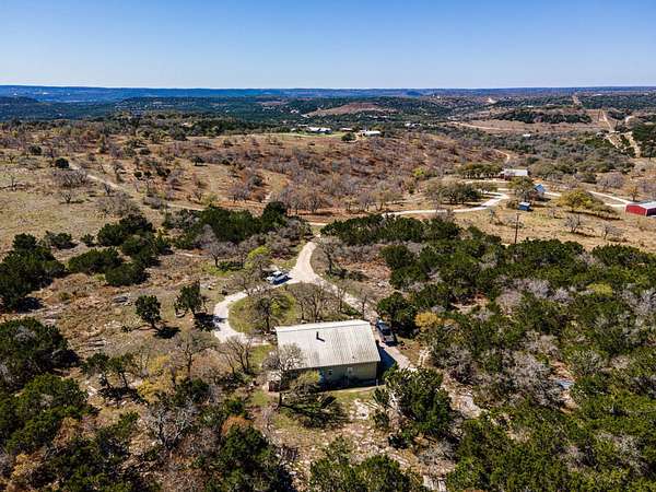 5.15 Acres of Land with Home for Sale in Blanco, Texas