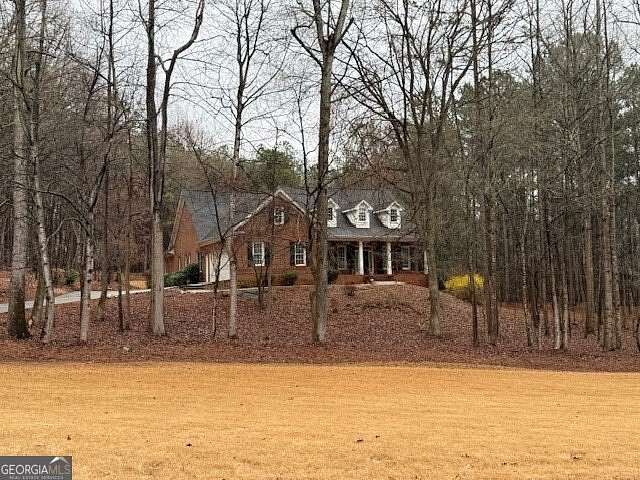 2.74 Acres of Land with Home for Sale in Hoschton, Georgia