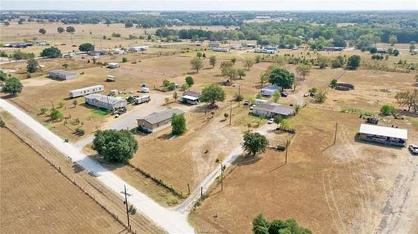 3.43 Acres of Land with Home for Sale in Madisonville, Texas
