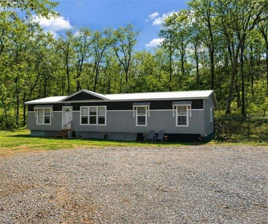 5.55 Acres of Land with Home for Sale in Muldrow, Oklahoma