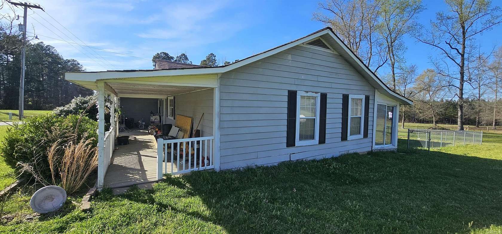 7.85 Acres of Land with Home for Sale in Kingsland, Arkansas