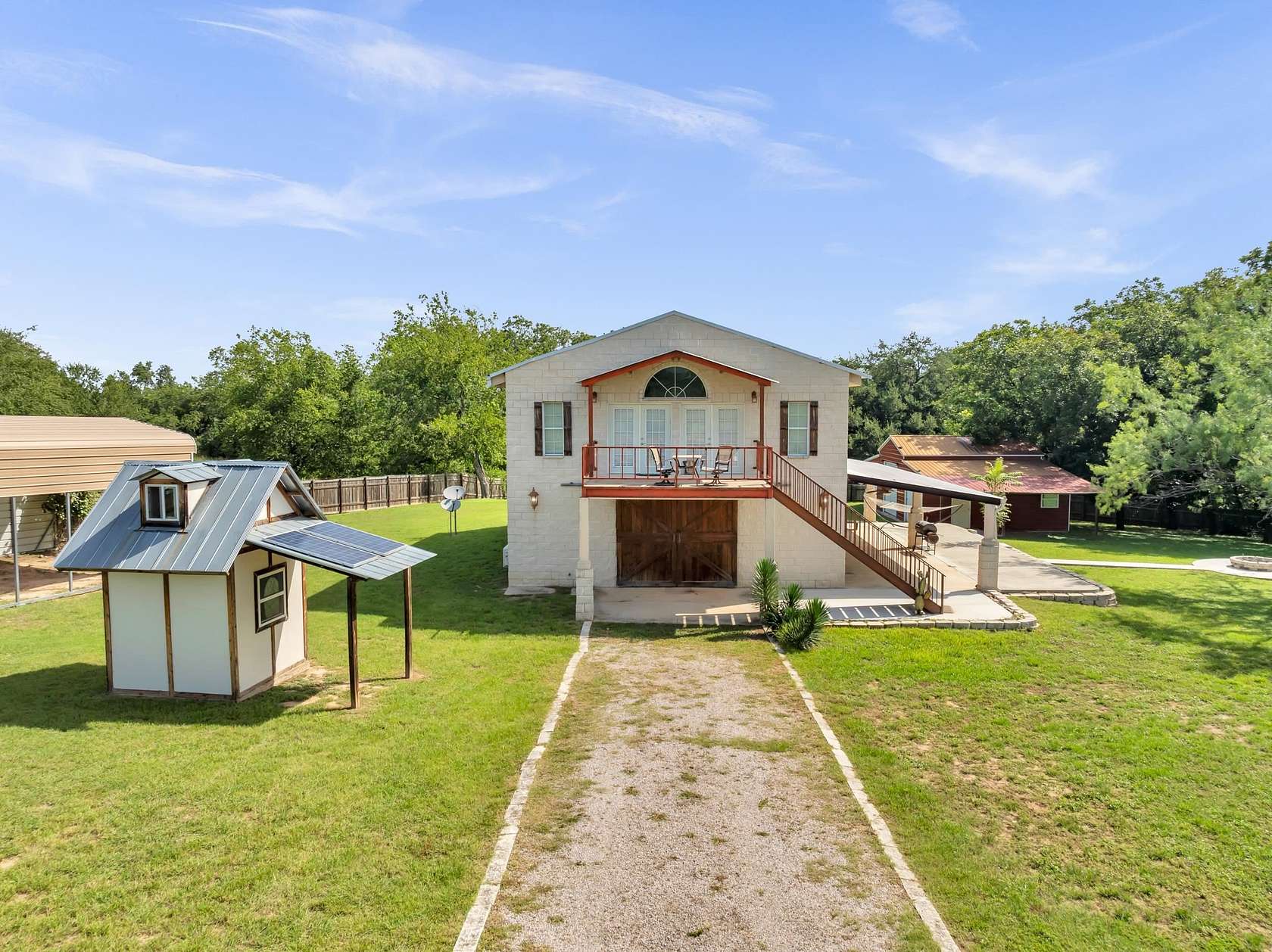 1.89 Acres of Land with Home for Sale in Kingsland, Texas
