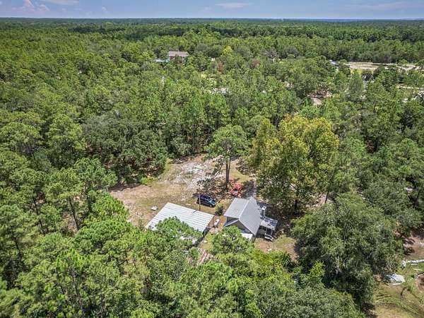 7.46 Acres of Land with Home for Sale in Crawfordville, Florida