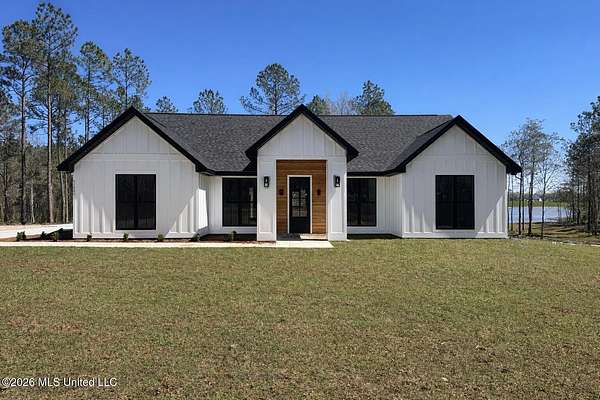 4 Acres of Land with Home for Sale in Kiln, Mississippi