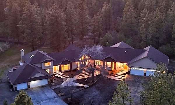 9.87 Acres of Land with Home for Sale in Mica, Washington