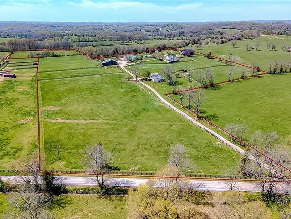 31.6 Acres of Agricultural Land with Home for Sale in Versailles, Kentucky
