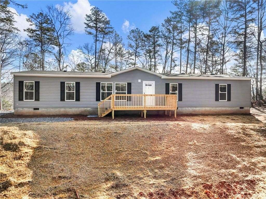 1.5 Acres of Land with Home for Sale in Lula, Georgia