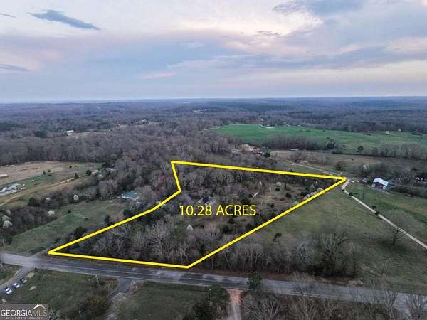 10.3 Acres of Land with Home for Sale in Commerce, Georgia
