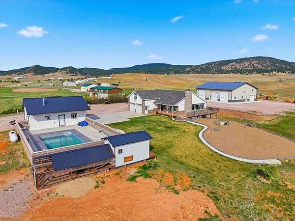 10.1 Acres of Recreational Land with Home for Sale in Sundance, Wyoming