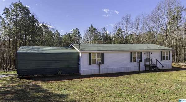 2 Acres of Land with Home for Sale in Heflin, Alabama
