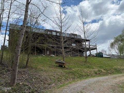 21.7 Acres of Agricultural Land with Home for Sale in Sevierville, Tennessee