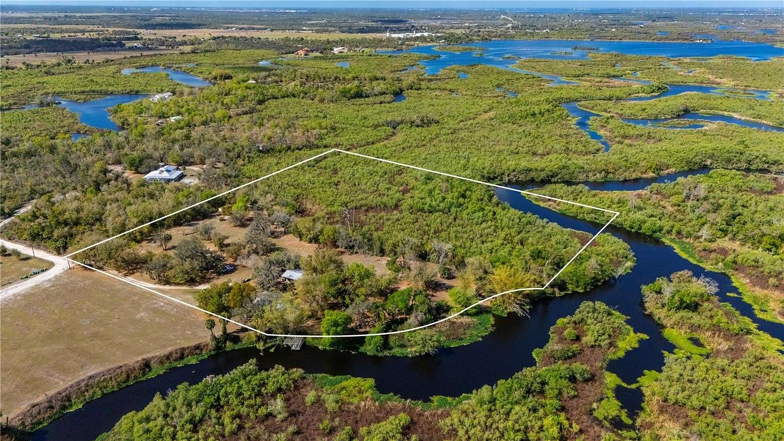 9 Acres of Land with Home for Sale in Punta Gorda, Florida