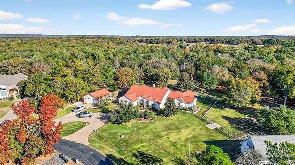 1.56 Acres of Land with Home for Sale in Lake Kiowa, Texas