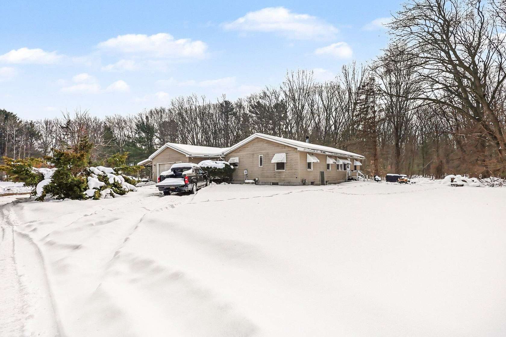 10.4 Acres of Land with Home for Sale in Spring Lake, Michigan