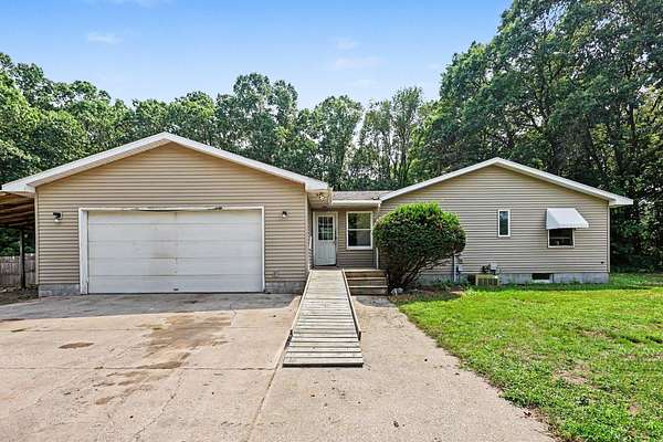 10.4 Acres of Land with Home for Sale in Spring Lake, Michigan