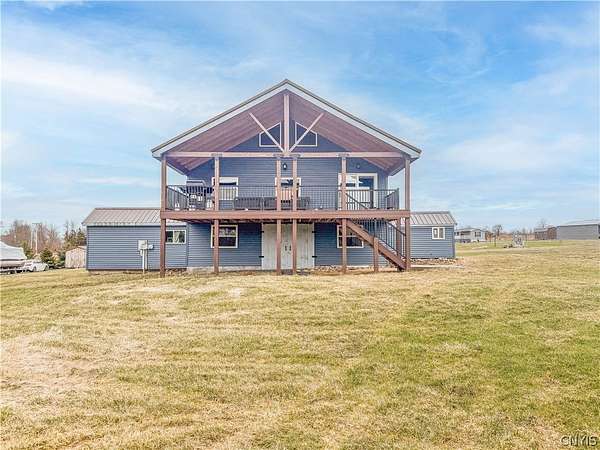 2 Acres of Land with Home for Sale in Three Mile Bay, New York