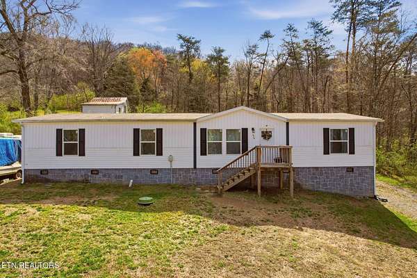 3.8 Acres of Land with Home for Sale in Powell, Tennessee