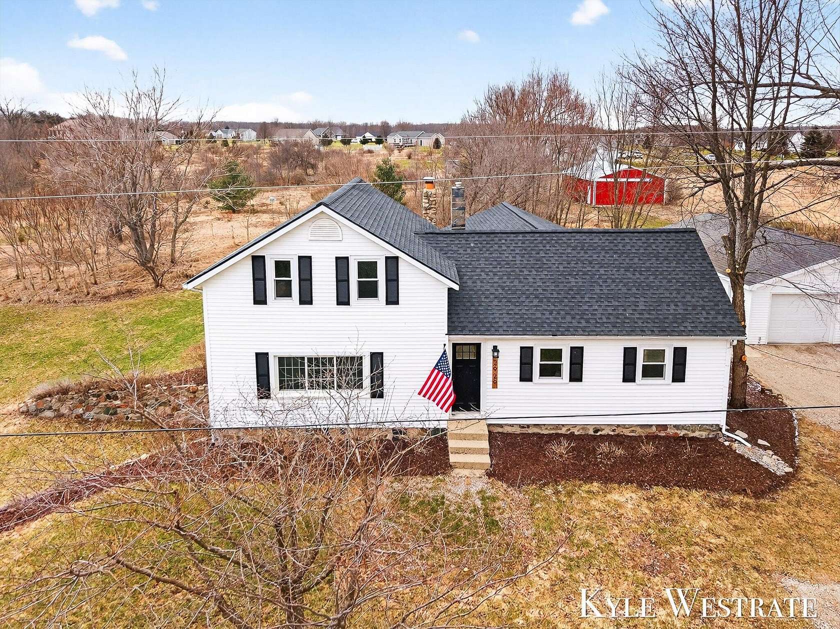 3.2 Acres of Land with Home for Sale in Lowell, Michigan