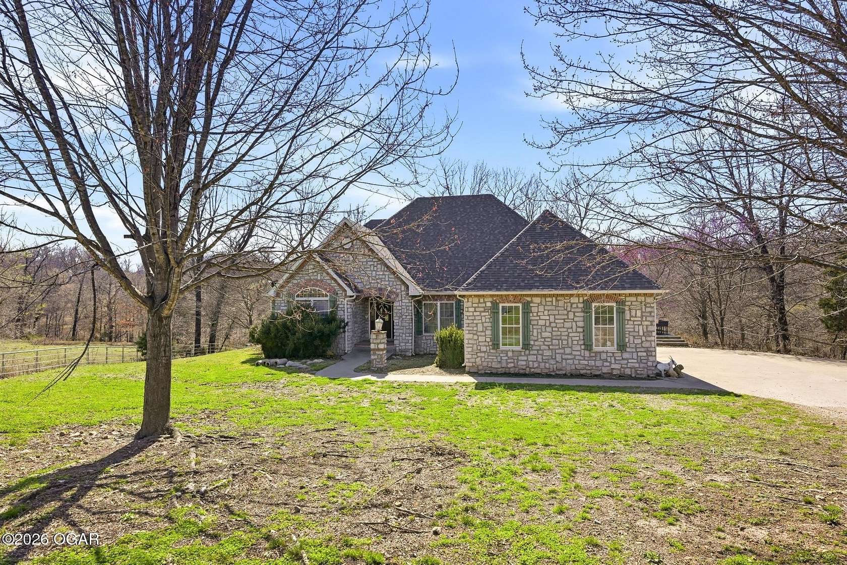 39 Acres of Land with Home for Sale in Goodman, Missouri