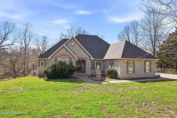 39 Acres of Land with Home for Sale in Goodman, Missouri