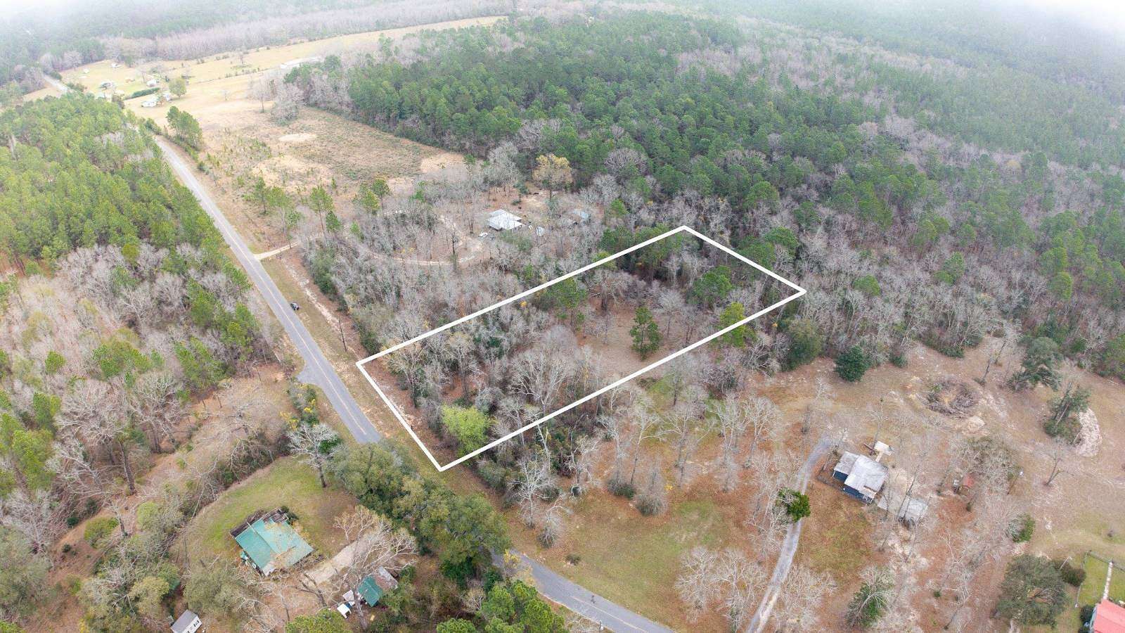1.5 Acres of Residential Land for Sale in Holt, Florida