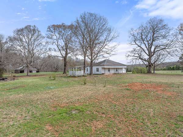 7.8 Acres of Land with Home for Sale in Lexington, Alabama