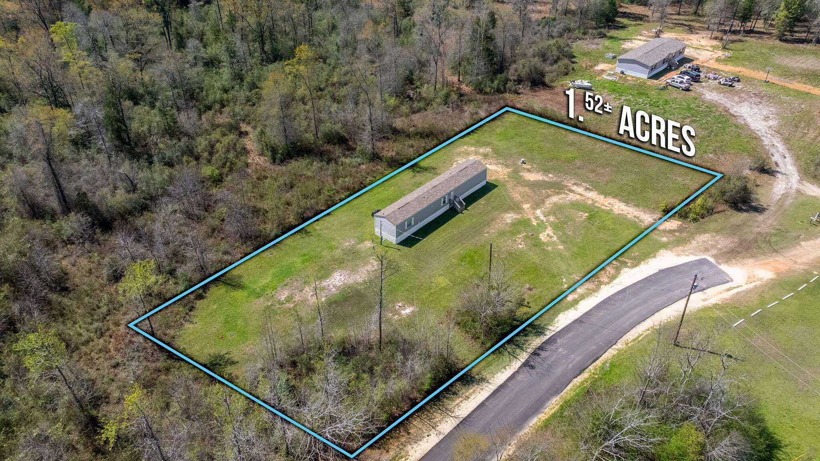 1.59 Acres of Land with Home for Sale in Baker, Florida