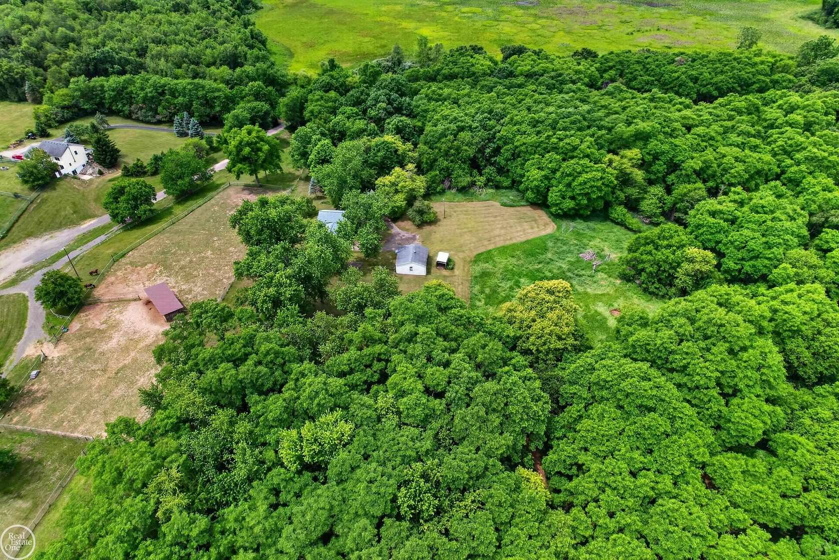 22.6 Acres of Land with Home for Sale in Grass Lake, Michigan