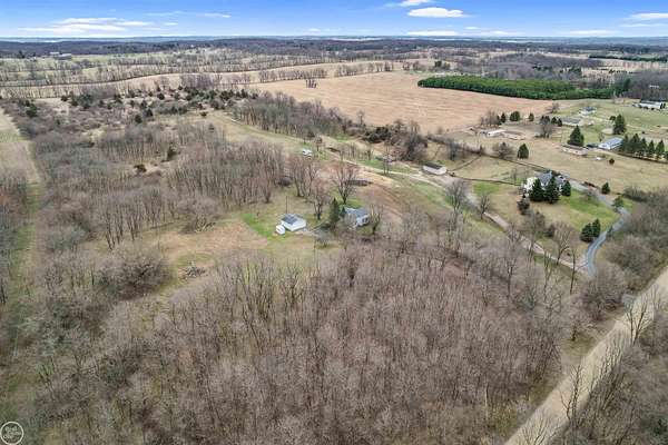22.6 Acres of Land with Home for Sale in Grass Lake, Michigan
