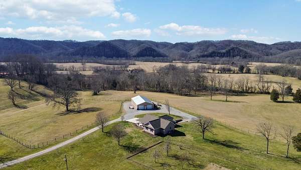 118 Acres of Land with Home for Auction in Burkesville, Kentucky