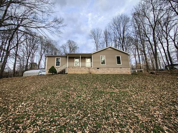 1.79 Acres of Land with Home for Sale in Woodlawn, Tennessee