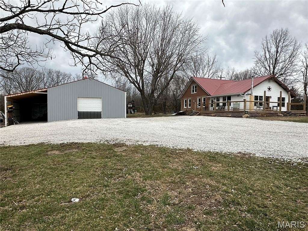 14.6 Acres of Land with Home for Sale in Owensville, Missouri