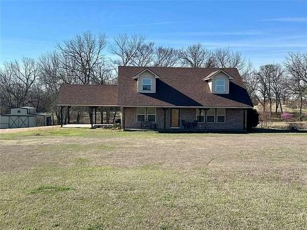 10.7 Acres of Land with Home for Sale in Sulphur, Oklahoma