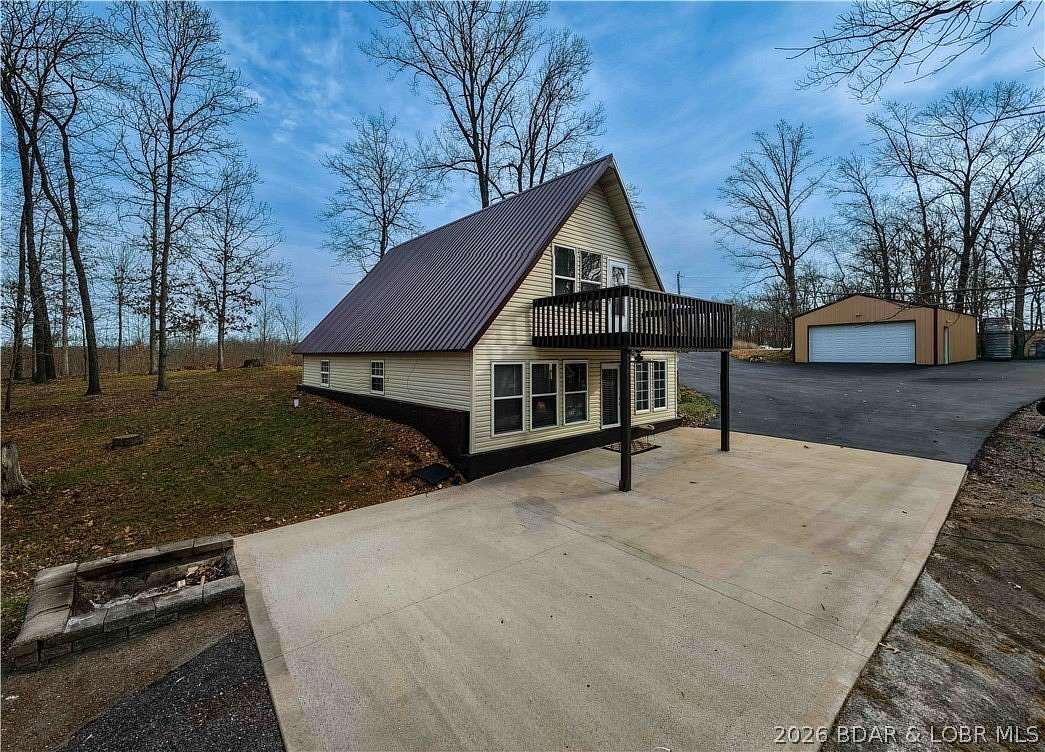 4.7 Acres of Land with Home for Sale in Stover, Missouri